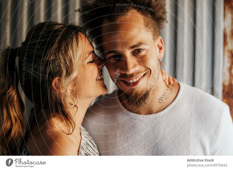 Young couple embracing in old building hug embrace love together casual male female relax lifestyle young harmony serene tender sensual relationship gentle