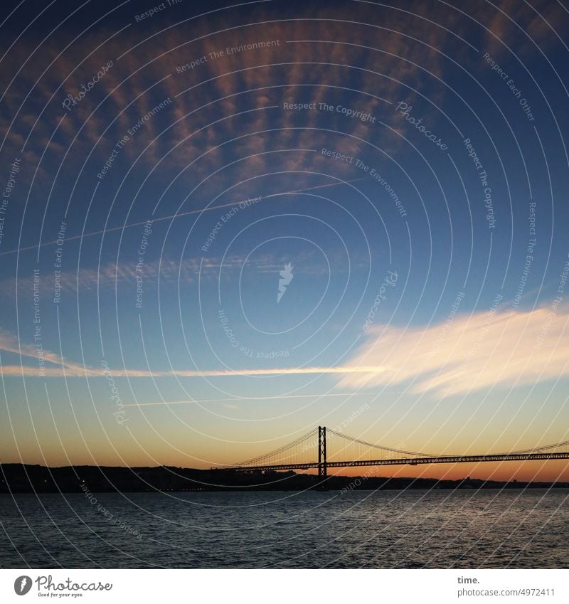 Places that mean something | Lisbon Bridge Sky Evening evening light Clouds Moody melancholically Water River Tejo travel Far-off places wide