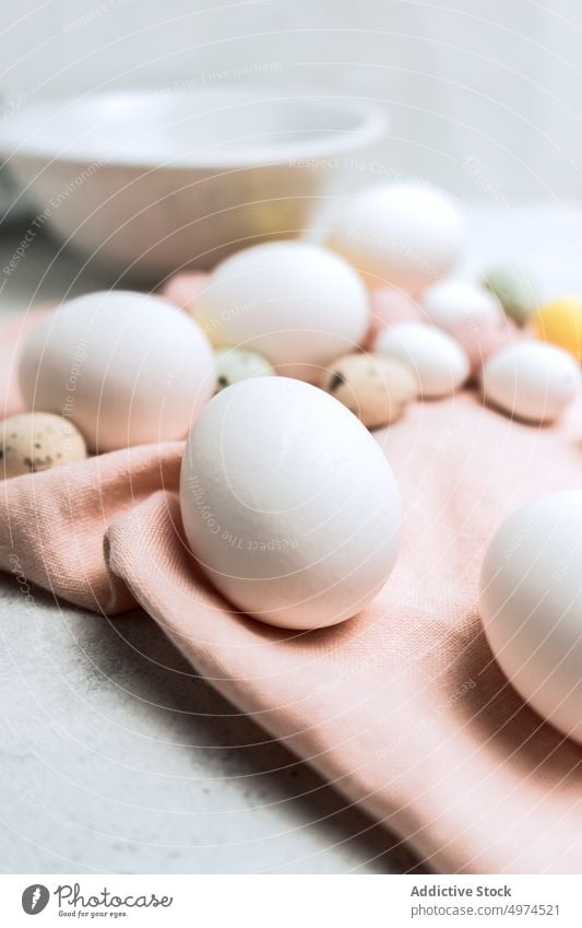 Still life of beautiful painted Easter eggs food table bowl brown colored dotted dyed easter easter egg eggshell cute pink elegant gift homemade organic pastel