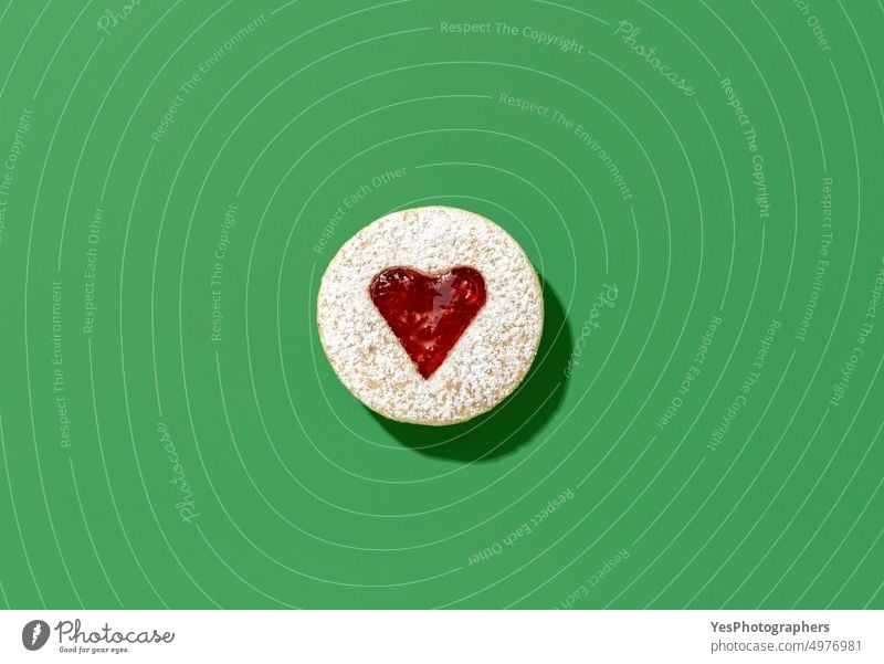 Linzer cookie top view on a green table. Traditional christmas dessert. above austrian background baked biscuit bright color confectionery cookies cuisine