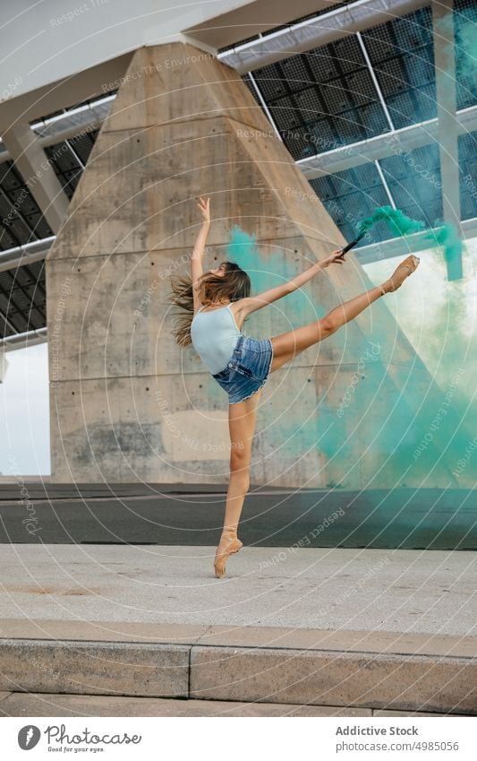 Professional Woman Ballet Dancer dancer ballet ballerina art dancing smoke bomb girl woman color outdoors young background adult holding green fun bombs beauty