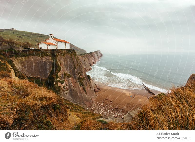 Coastal landscape with bad weather basque country zumaia san telmo cliff sea chapel spain gipuzkoa ocean pais building ancient coast rocky guipuzcoa vasco