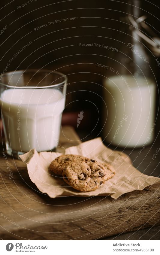 Homemade chocolate chips cookies baked crunchy food homemade milk rustic glass sugar straw sweet tasty delicious fresh cuisine dessert pastry crust recipe