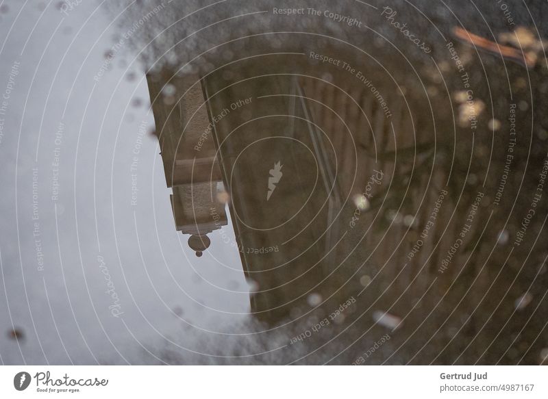 Playing regulation of a monastery wall in a puddle Autumn Puddle Rainy weather reflection Reflection Wet Water Weather Bad weather Exterior shot Street Deserted