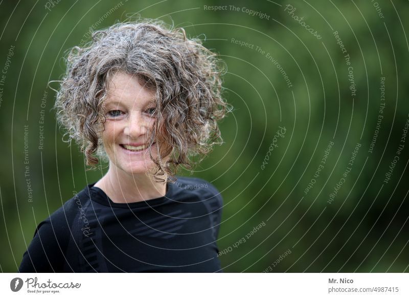 curly hair portrait Congenial Attractive Friendliness Hair and hairstyles Emanation Sympathy Facial expression Smiling Curl naturally Contentment Happy