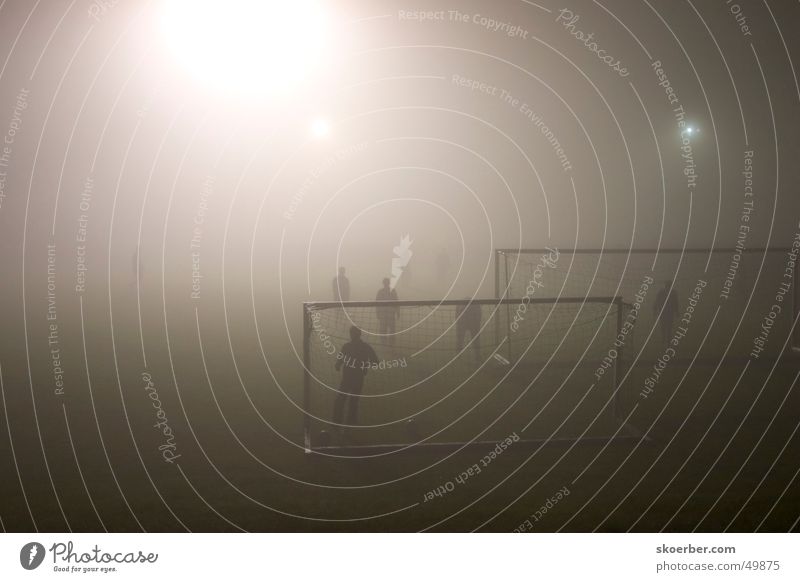 Football match in fog Fog Floodlight Soccer Gate Lawn amateur football field Sports Training