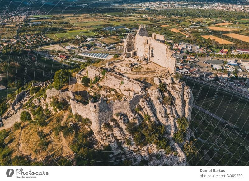 Castle de Crussol - in the commune of Saint-Peray that dominates the valley of Rhone - Rhone-Alpes - France ancient architecture battlements beautiful blue