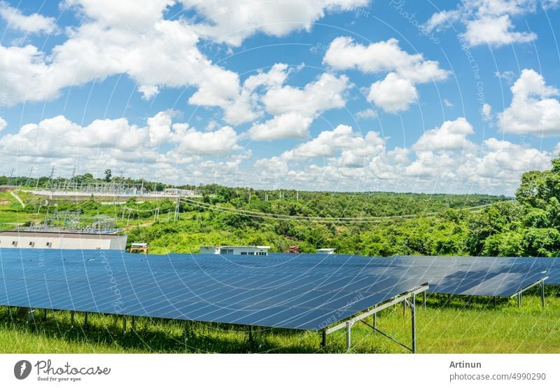 Photovoltaic power station or solar park. PV system. Solar farm and green field. Solar power for green energy. Photovoltaic power plant generate solar energy. Renewable energy. Sustainable resources.