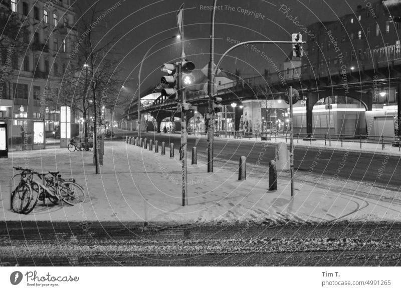 Snow lies at night in Schönhauser Allee Berlin Prenzlauer Berg Night Winter b/w Capital city Town Downtown Exterior shot Deserted Black & white photo Old town