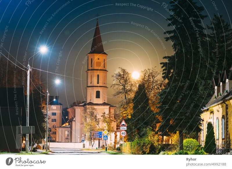 Ruzhany, Brest Region, Belarus. Rising Moon Above Trinity Church In Autumn Night. Famous Historic Landmark Brest region Polesia architecture autumn beautiful