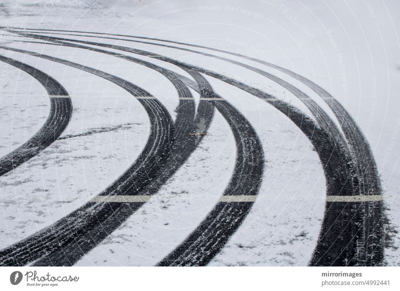 tire tread marks on fresh snow fall driveway tire imprints on snow automobile winter snow tracks abstract cold ice weather car wheel season traffic frost