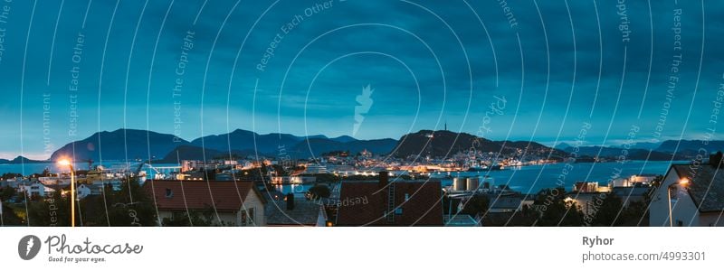 Alesund, Norway. Night Alesund Skyline Cityscape. Historical Center In Summer Evening. Famous Norwegian Landmark And Popular Destination. Alesund, Kiven viewpoint, Mt. Panorama Panoramic View.