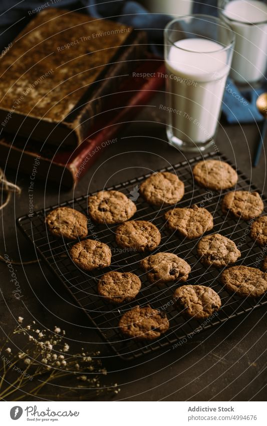 Homemade chocolate chips cookies baked cooling rack crunchy food homemade milk rustic glass sugar sweet tasty delicious fresh cuisine dessert pastry crust