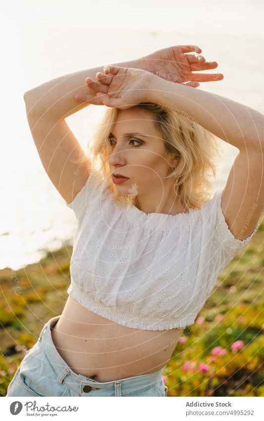 Woman dancing near sea at sunset woman dance shore dancer perform summer weekend water aviles asturias spain female romantic coast sundown skill seaside