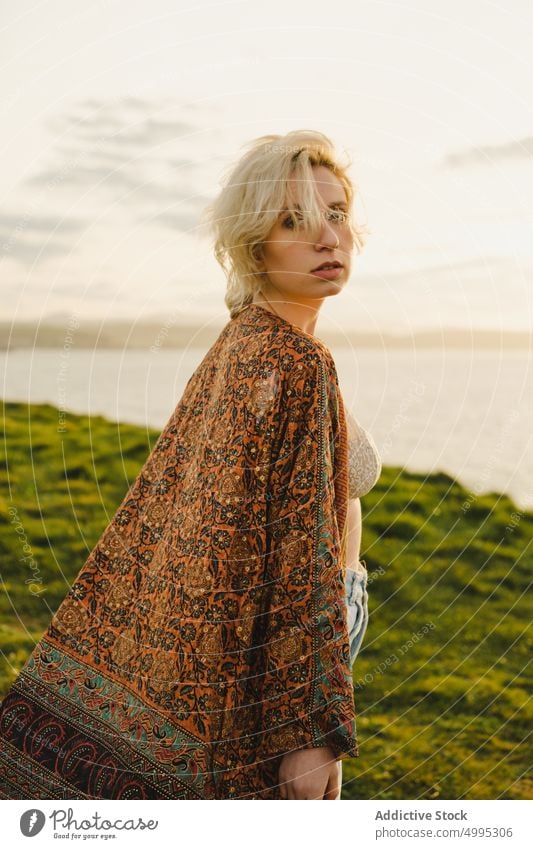 Sensual blond female in field woman sensual sunset summer countryside calm tender weekend aviles asturias spain evening bra robe jeans sundown grassy seductive