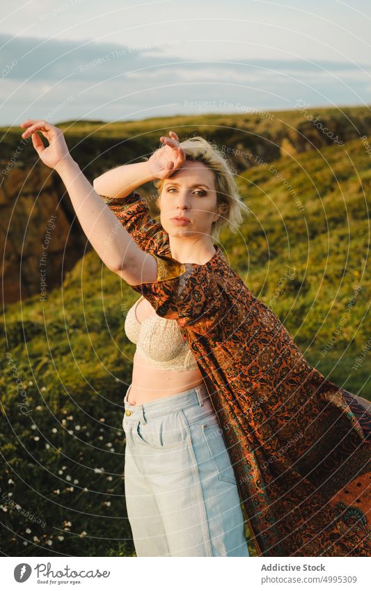 Sensual blond female in field woman sensual sunset summer countryside calm tender weekend aviles asturias spain evening bra robe jeans sundown grassy seductive