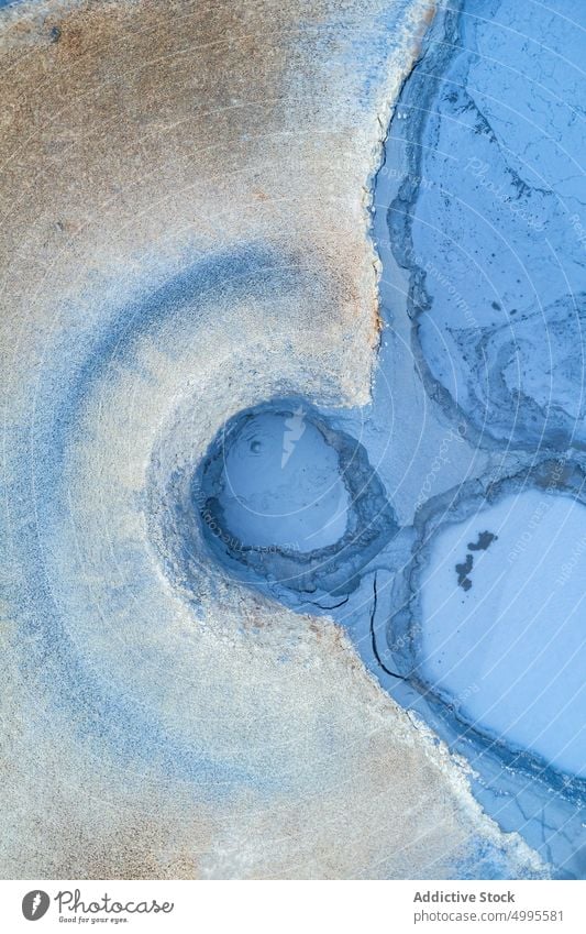 Bubbling mudpot in geothermal area bubble crater ground volcanic terrain rough reykjahlid iceland hverir nature surface formation pool mineral geology climate