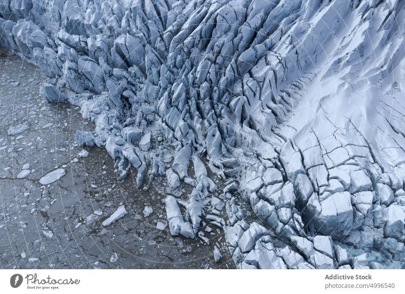 Scenic volcanic terrain with textured glacier ice frozen winter background massive formation nature surface rough crack vatnajokull iceland weather north