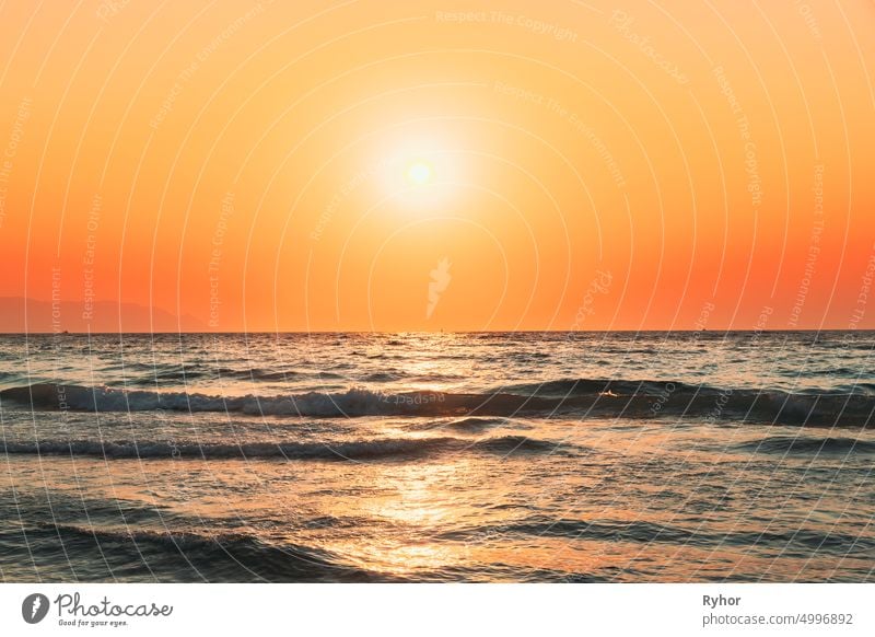 Evening Sun Sunshine Above Sea. Natural Sunset Sky Warm Colors. Ripple Seascape bay beautiful europe evening horizon landscape light morning nature ocean