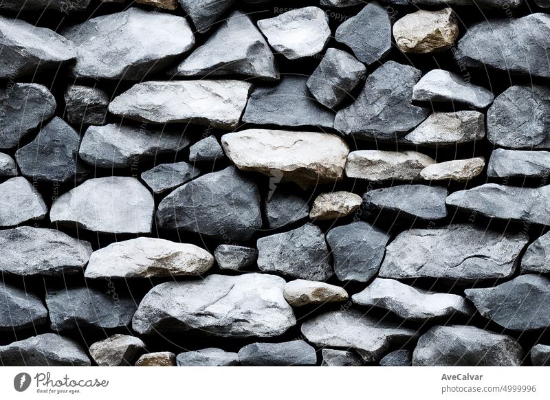 Black stone background. Top view. Free copy space.textured square floor ceramic tiles.Panorama of black modern stone wall background and pattern material rough