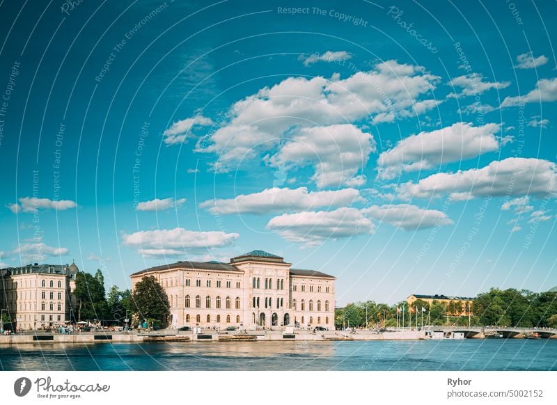 Stockholm, Sweden. National Museum Of Fine Arts Is The National Gallery Of Sweden, Located On The Peninsula Blasieholmen. Touristic Pleasure Boats Floating Near Nationalmuseum In Sunny Summer Day