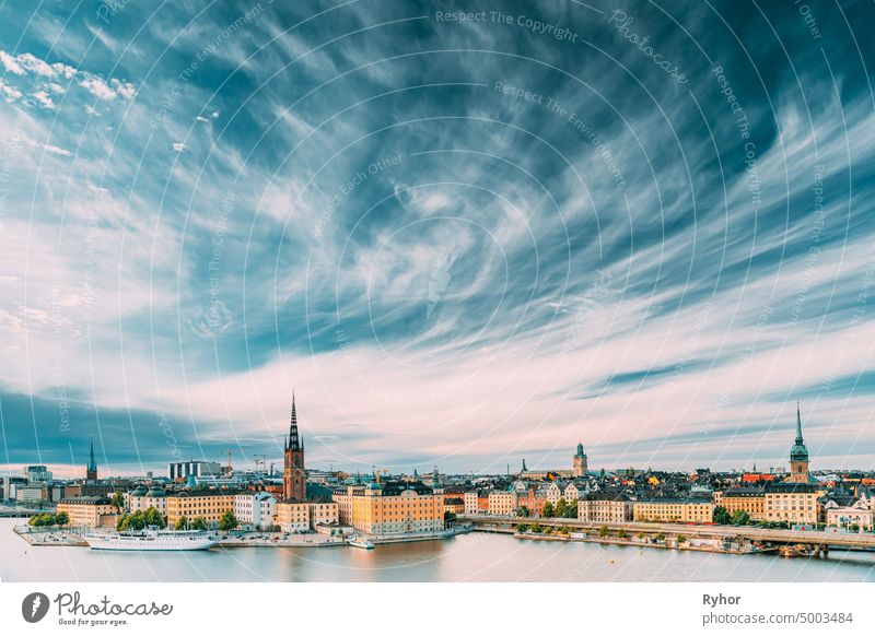 Stockholm, Sweden. Scenic Famous View Of Embankment In Old Town Of Stockholm At Summer. Gamla Stan In Summer Evening. Famous Popular Destination Scenic Place And UNESCO World Heritage Site