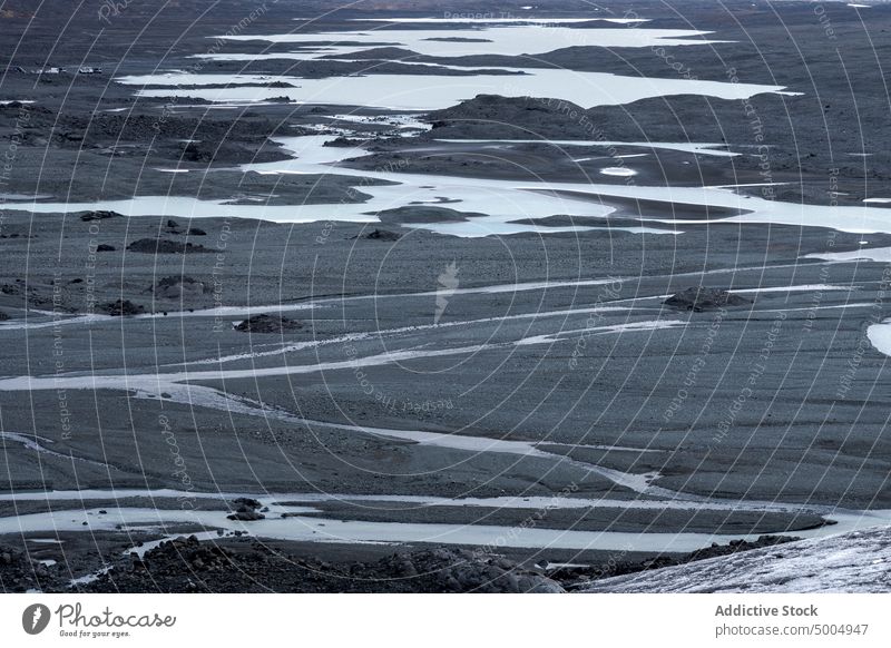 Wetland on cold winter day plain river snow gray picturesque landscape weather frozen iceland vatnajokull national park spectacular countryside terrain north