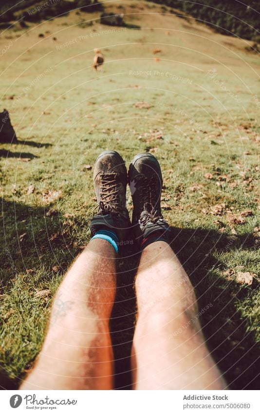 Close-up of a woman's legs with hiking boots in the forest nature lifestyle closeup outdoor activity people foot healthy sport active young feet person shoes