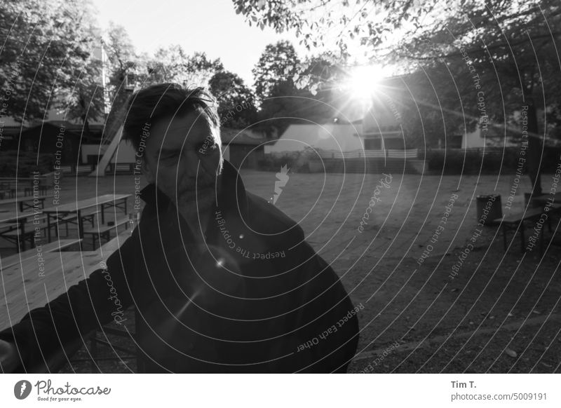 Man beer garden backlight Beer garden b/w Autumn Black & white photo B/W Day Exterior shot B&W Calm Loneliness Berlin