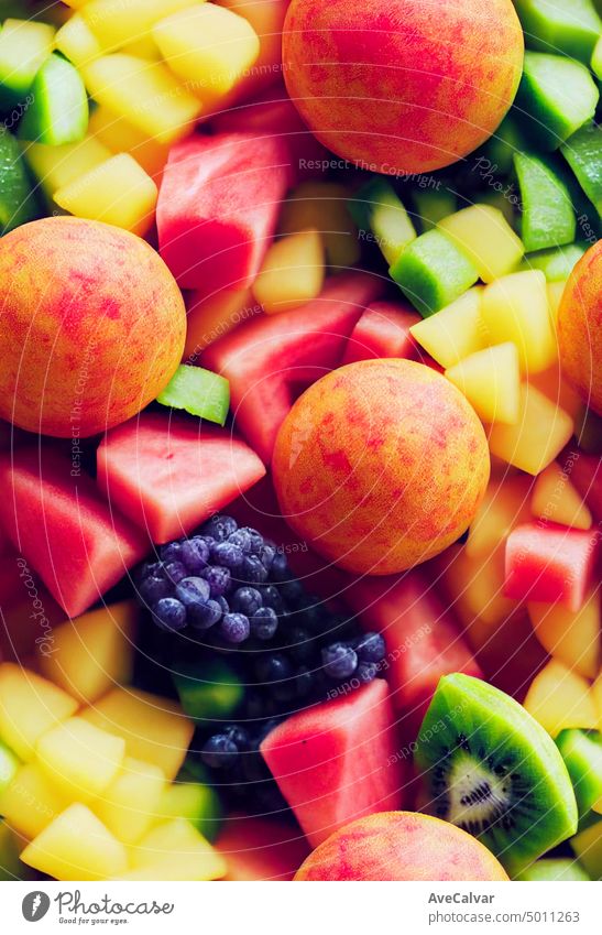 Colorful fruit salad. watermelon and melon salad. fresh summer food. close up freshness vitamin banana strawberry assorted fiber juicy kiwi colourful mixed