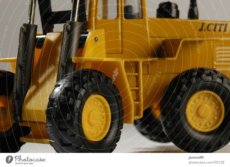 j.citi Yellow Multicoloured Construction site Toys Excavator Wheel loader Interior shot Silhouette Colour Bright Ladder Detail Studio shot grey background