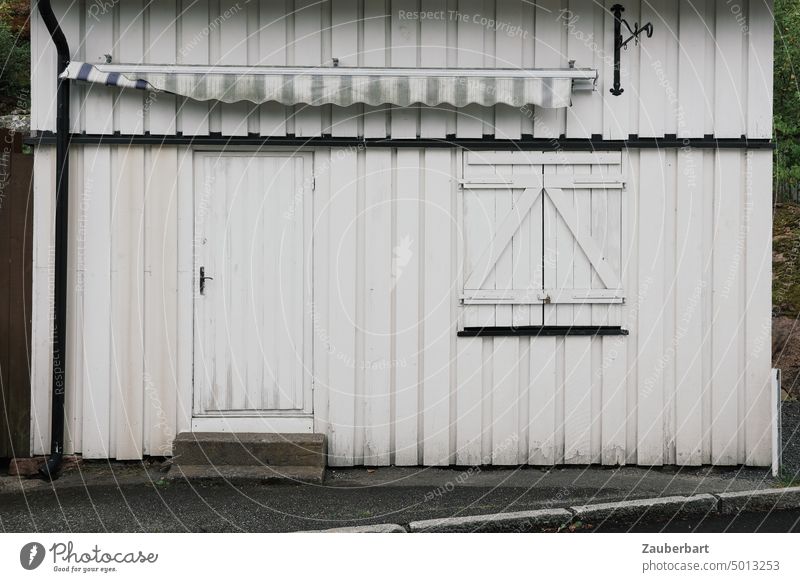 White wall of Norwegian wooden house with closed door and shutters Wall (building) Wood Wooden house Norway norwegian Shutter Window Closed locked