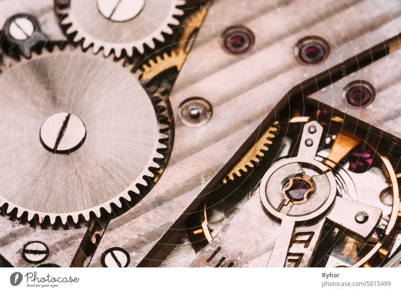 Old Clockwork Background. Clock Watch Mechanism With Gray And Golden Gears. Vintage Mechanism With Movement Mechanics dirty motion steel gray mechanism golden