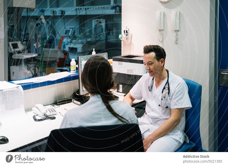 Doctors in a break sitting at work doctor hospital medical relax treatment relaxation healthcare nurse professional physician pediatrician specialist staff