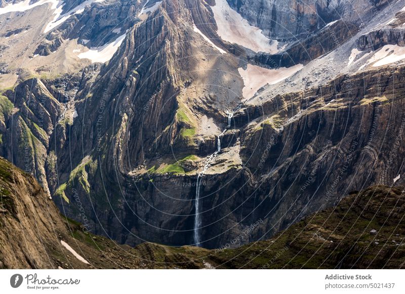 Rough mountain with waterfall in highlands stream cirque nature rock rough creek pyrenees cirque de gavarnie gavarnie falls france spectacular terrain river