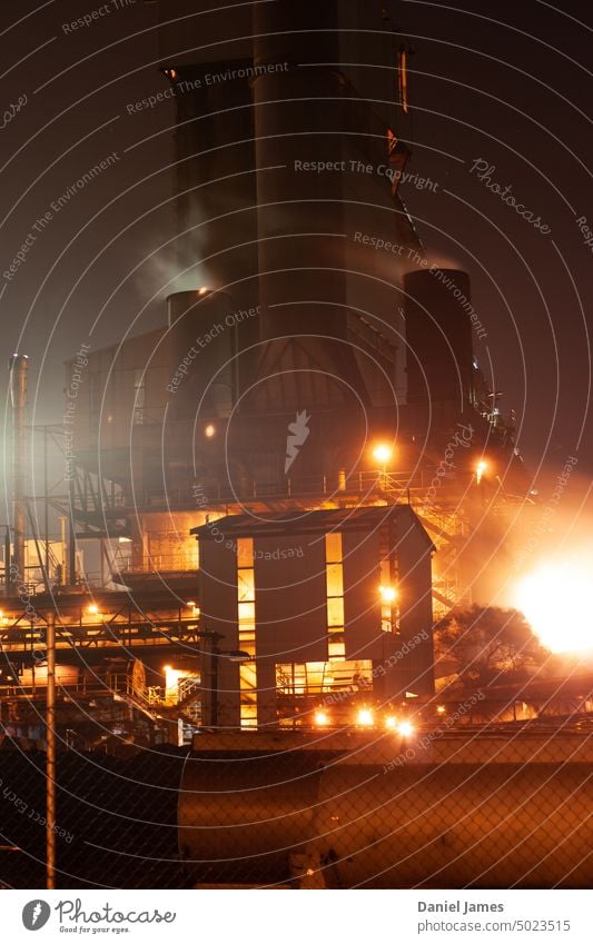 Old Steelworks glows in the night. steelwork steelworks Industry Heavy industry Night Glow manufacturing Steel factory Steel industry Industrial plant