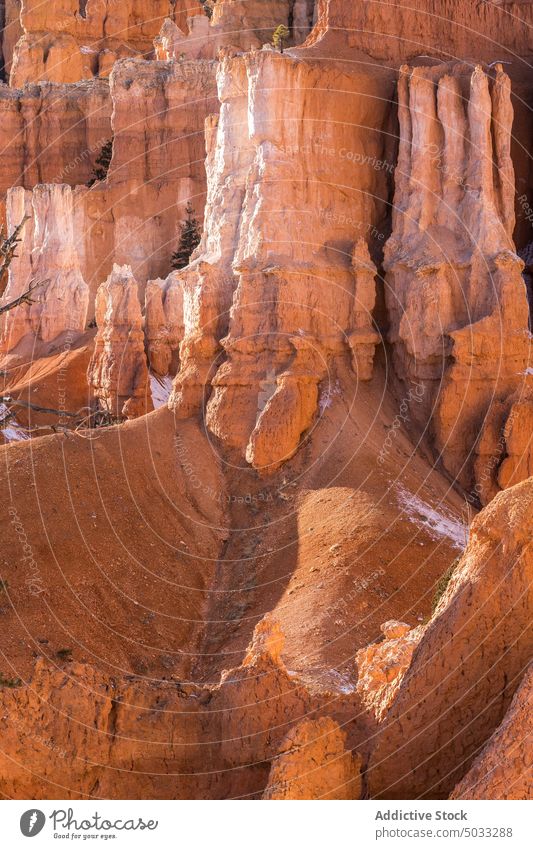 Rocky formations in Bryce Canyon on sunny day rock hoodoo picturesque bryce canyon national park mountain uneven cliff nature landscape rocky rough surface