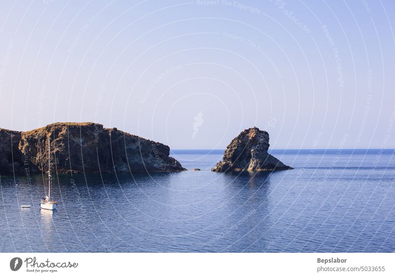 View of Faraglioni in the Pantelleria island, Sicily pantelleria faraglioni punta tracino sicily boats summer Italy lava Mediterranean sea marine mediterranean