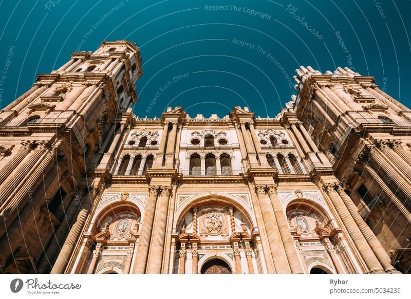 Malaga, Spain. Facade Wall Of Bell Tower Of The Cathedral Of The Incarnation. Famous Landmark historical spanish travel exterior andalucia outdoor building