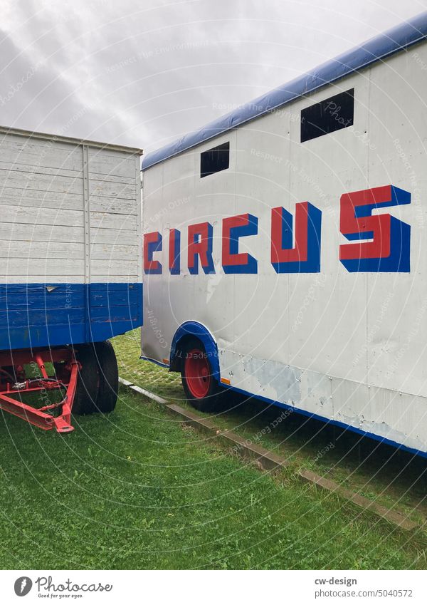 Not my circus, not my monkeys Circus Monkeys Exterior shot Deserted Circus trailer entertainment enterprise Introduction Artists Red White Blue Colour photo Day