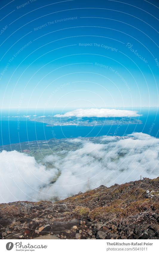 view from the volcano to the island of Horta horta Island Azores Volcano stones Clouds Rock crater Hiking Pico mount Pico montanha do pico ascent Water Ocean