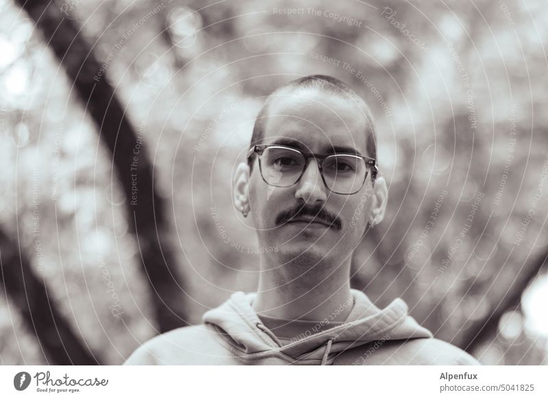 young male Young man Masculine portrait Adults Man 18 - 30 years Human being Shallow depth of field Black & white photo Face Facial hair Exterior shot