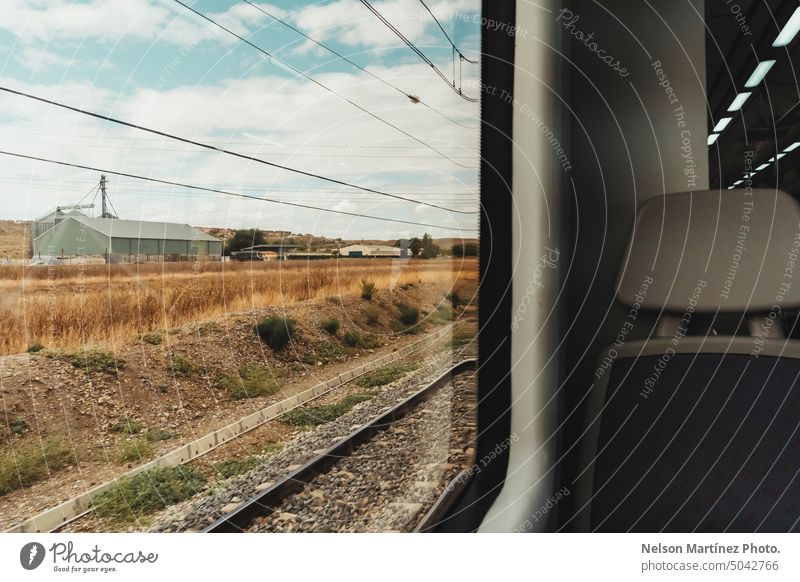 View of the railway tracks from the window travel interior motion filtered trip blur concept train journey speed transport sunset transportation view sky nature