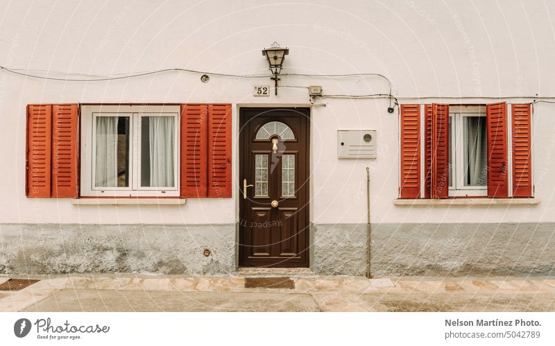 Facade of a Country house in a town stone residential building rural architecture late country urban historic tour tourism pretty travel countryside evening