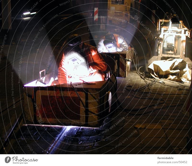 Night on earth Welding Light Work and employment Railroad tracks Dark Couple Man Working man Welder Night work Hot Narrow Physics Night shot Exterior shot