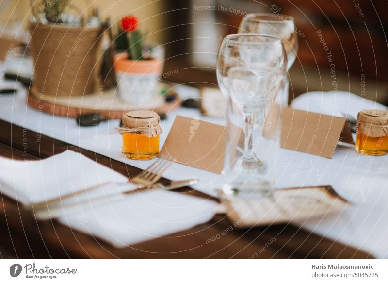 wedding decoration table in yellow tones boho brown brown and white dining dinner elegant glass glasses luxury outdoors party pastel restaurant setting style