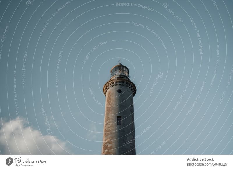 Lighthouse against blue sky lighthouse weather tower navigate guide landmark building maspalomas gran canaria canary islands spain construction beacon structure