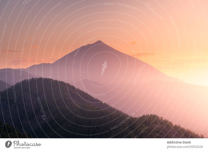 Mountain peak under sunset sky landscape highland picturesque scenery mountain rocky island tenerife spain canary islands range slope nature scenic ridge