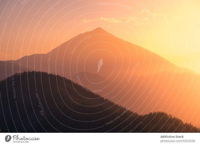 Mountain peak under sunset sky landscape highland picturesque scenery mountain rocky island tenerife canary islands spain range slope nature scenic ridge