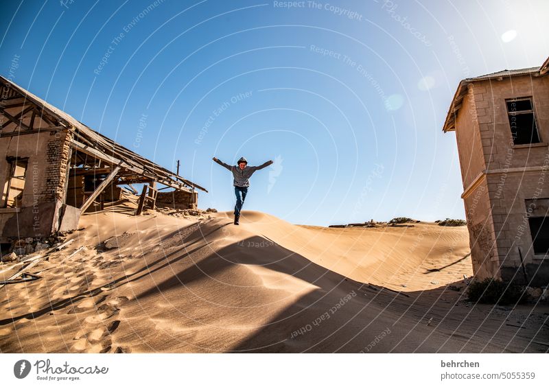 sand flea duene Freedom fortunate Happy Joie de vivre (Vitality) Joy Sky Warmth Playing Romp muck about Walking Child Infancy Boy (child) Africa Namibia Desert